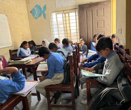 An empty classroom chair symbolizing an absent Christian student at MinorCare’s school in Pakistan.