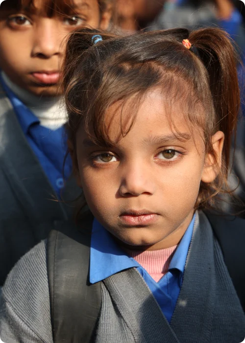 An empty classroom desk representing an absent Christian student at MinorCare in Pakistan.