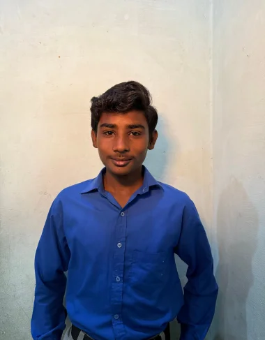 Kamran Ashiq, a Christian Grade 4 student supported by MinorCare, photographed in his classroom in Pakistan.
