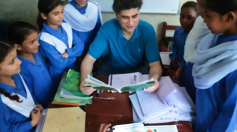Christian children at MinorCare studying together in a bright classroom environment in Pakistan.