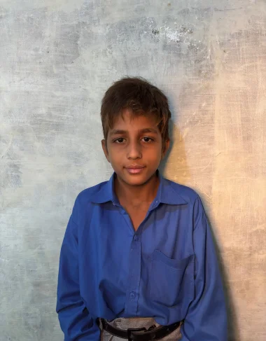 Christian boy Husnain Naveed learning at MinorCare Foundation school Pakistan funded by US nonprofit donors